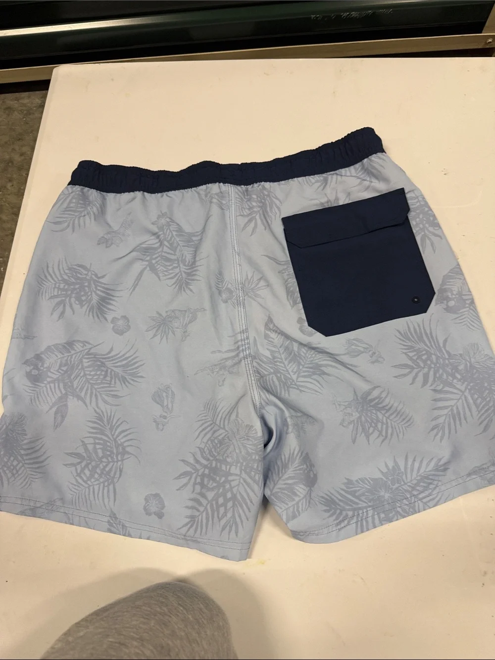 Light Blue Tropical Print Swim Trunks with Navy Waistband